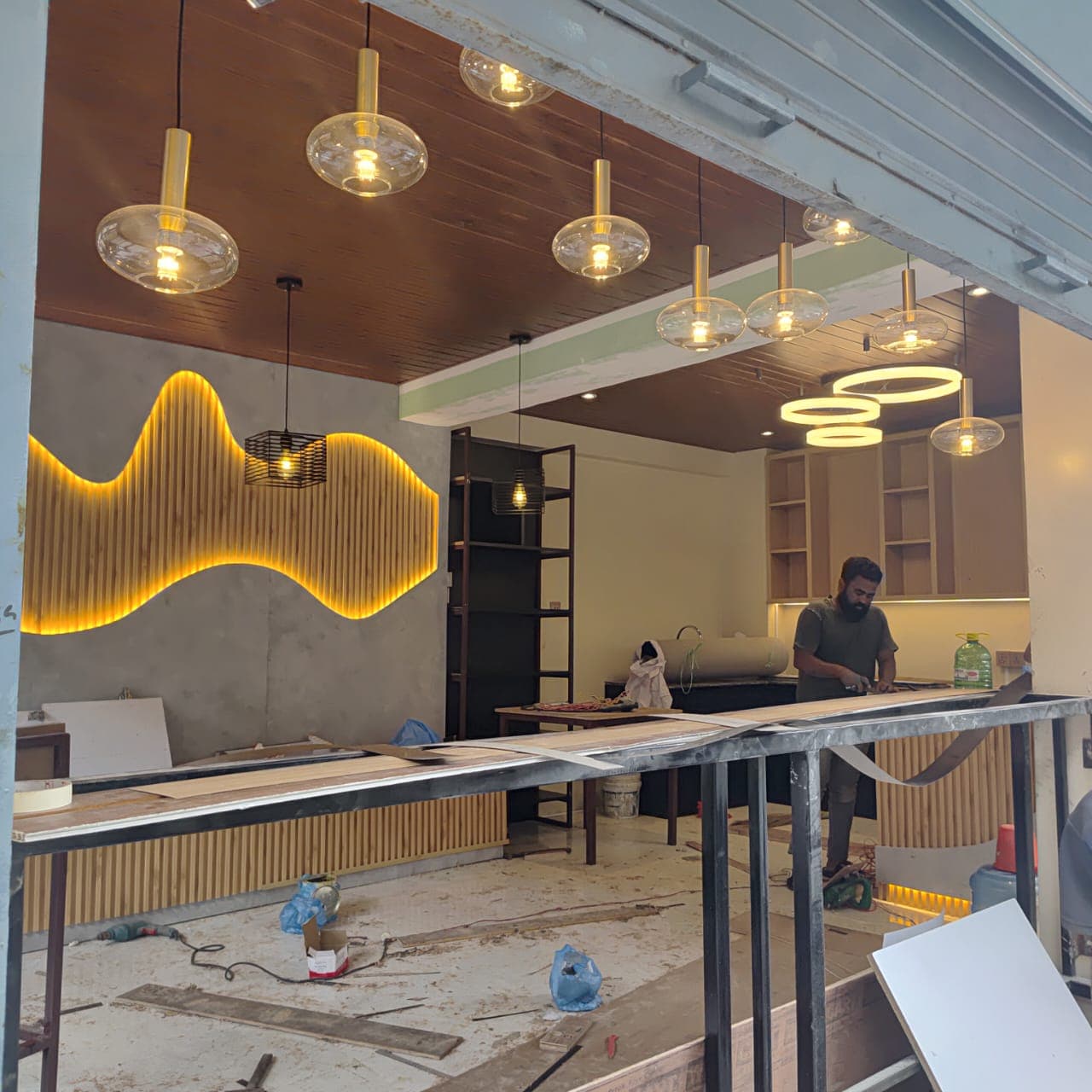 Shiv Café mid construction, bare shell with feature wall going in